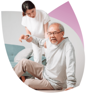 A Support Worker helps an NDIS Participant who has fallen, prior to reporting through NDIS Incident Management Software.