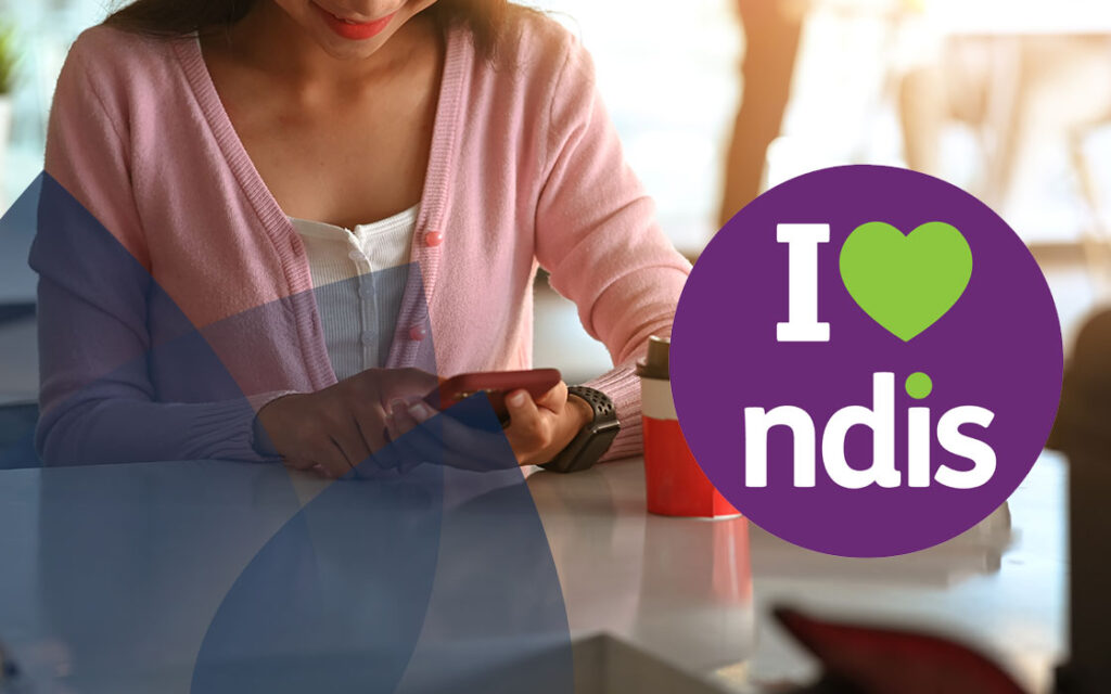 A woman sits using her mobile phone with the I Love NDIS logo superimposed on the right